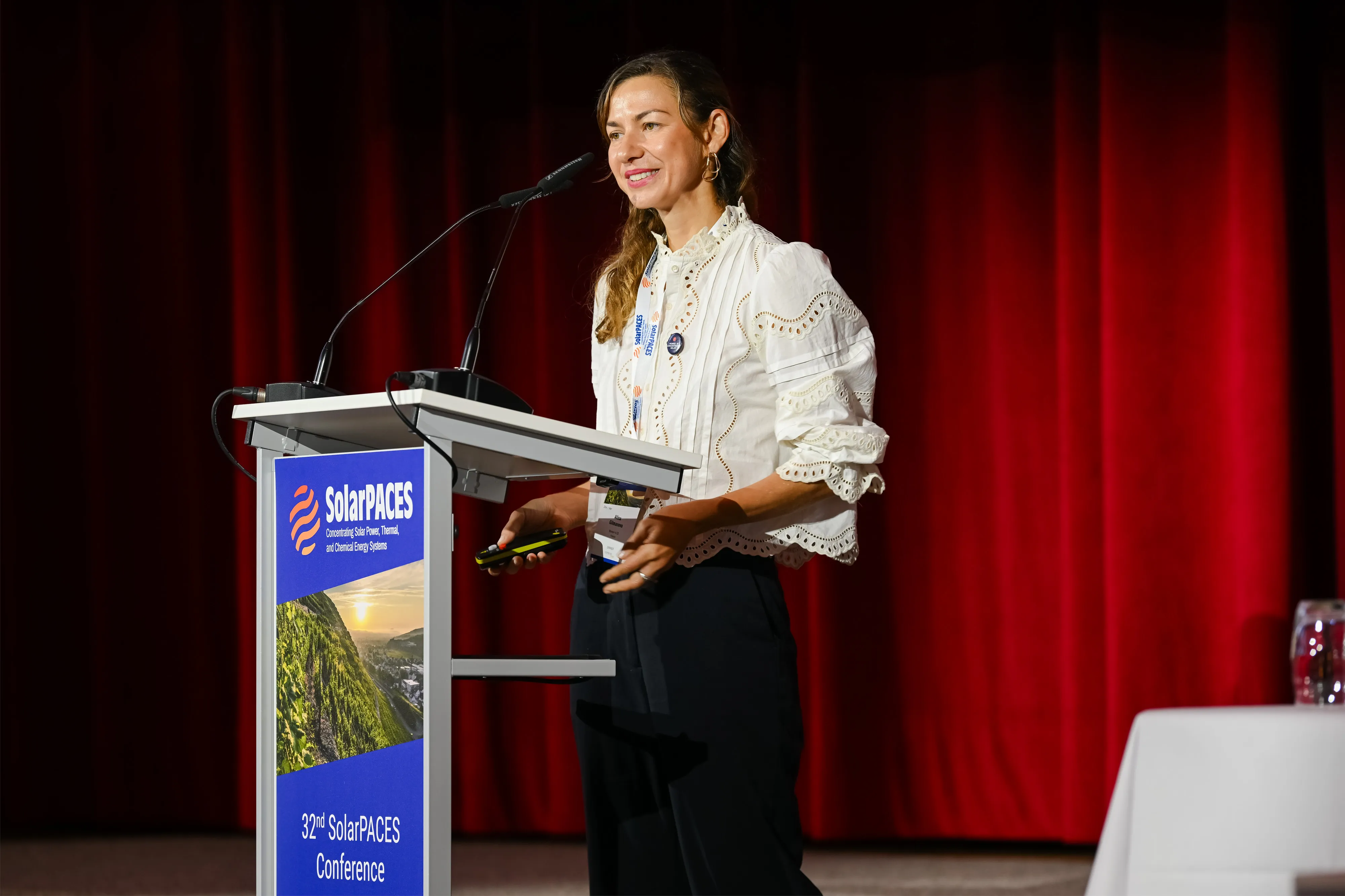 Alina Gilmanova speaking at the SolarPACES conference